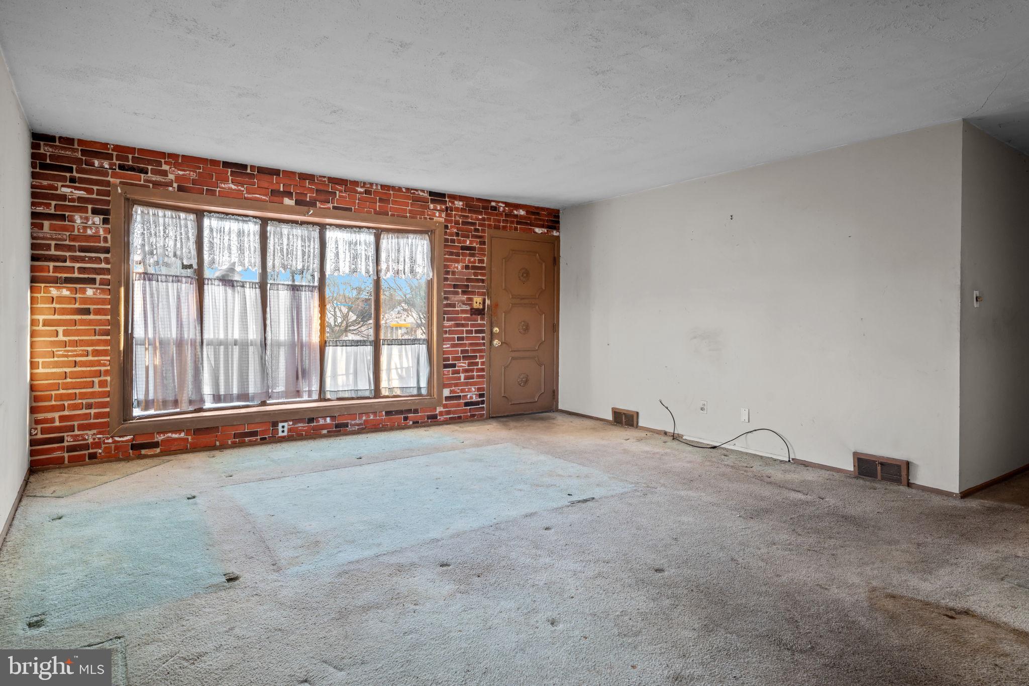 3723 Ridgewood Lane Brookhaven, PA 19015 - Photo 10 of 22 a view of an empty room with a window