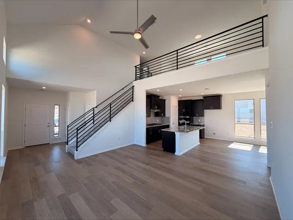 a view of kitchen with cabinets and wooden floor