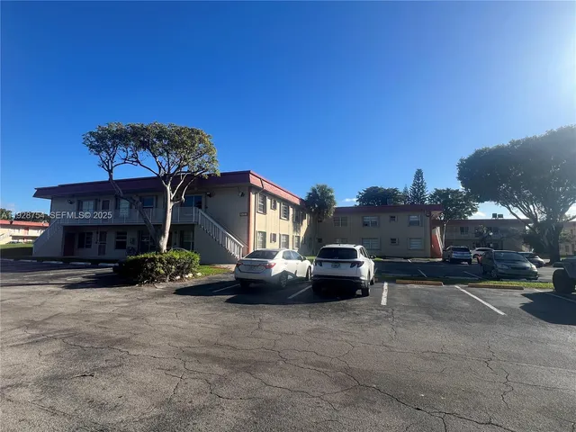 a view of street with parked cars