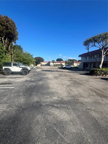 a view of a street with houses