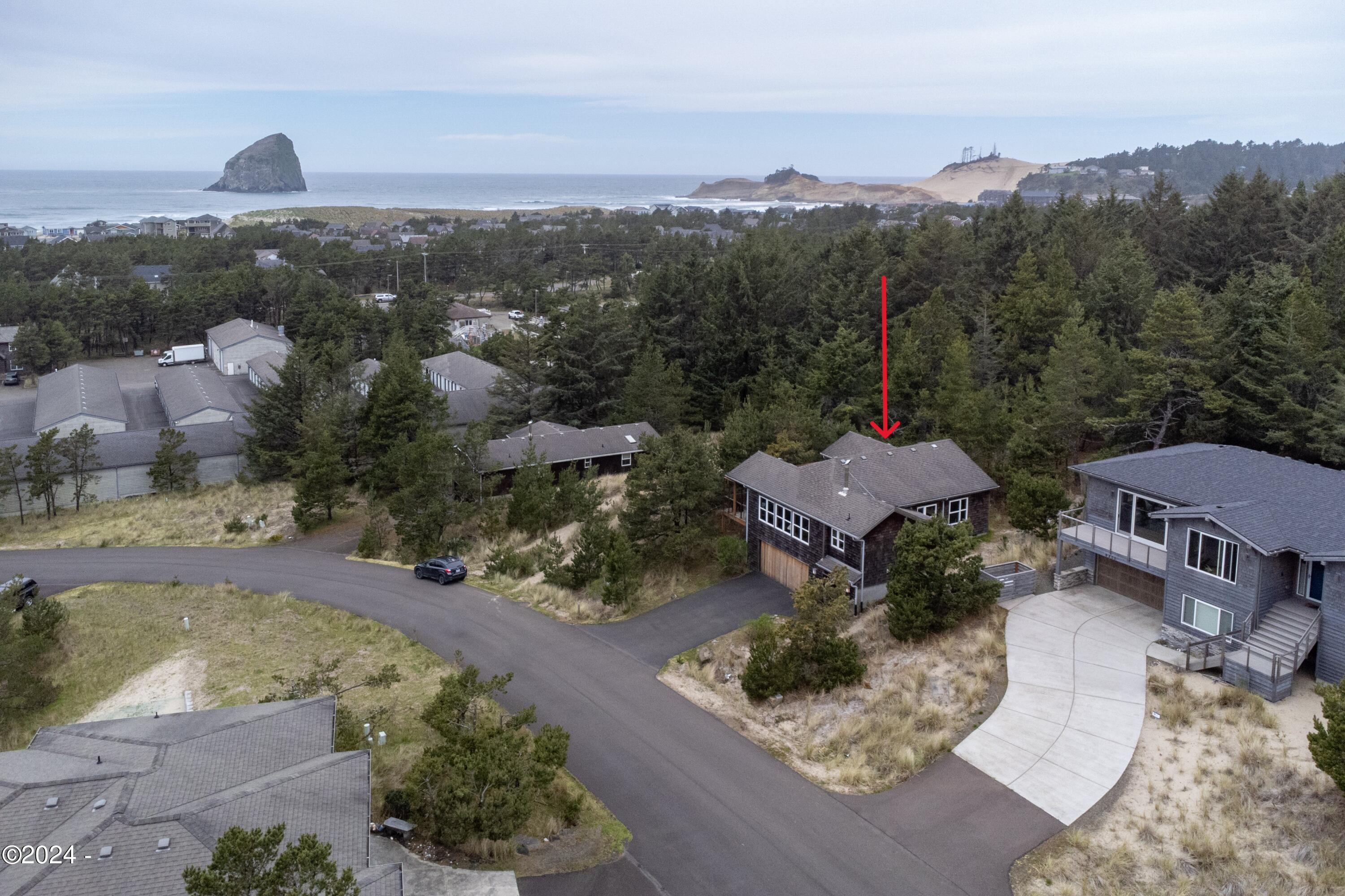 6855 Nestucca Ridge Road Pacific City, OR 97135 - Photo 1 of 44 an aerial view of a house with a garden