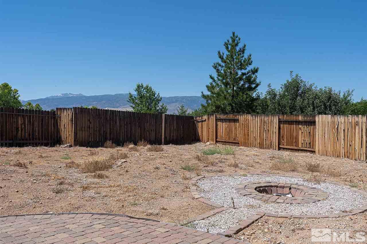 3443 Weaver Place Reno, NV 89512 - Photo 20 of 23 a backyard of a house