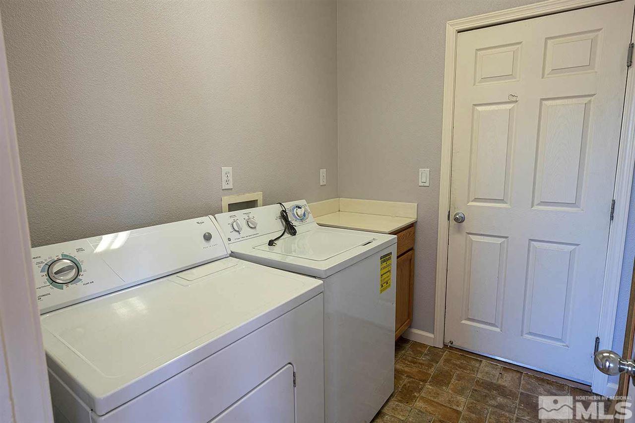 3443 Weaver Place Reno, NV 89512 - Photo 9 of 23 a utility room with dryer and washer