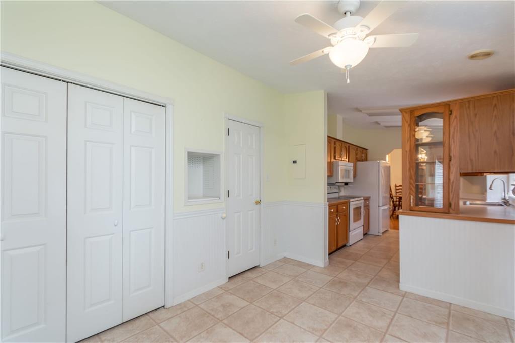 457 1/2 Whitestown Road Butler, PA 16001 - Photo 13 of 25 standard door to pantry, folding doors to washer/dryer