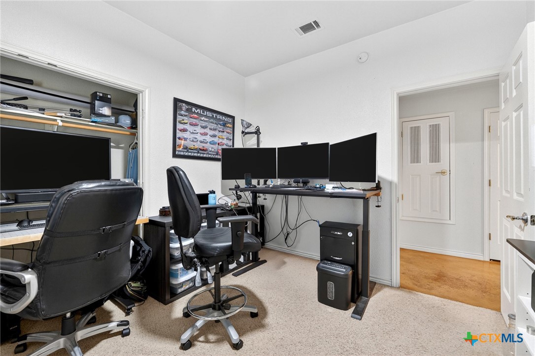 421 Sunset Ridge Drive Killeen, TX 76549 - Photo 10 of 47 a view of a workspace with furniture and a window
