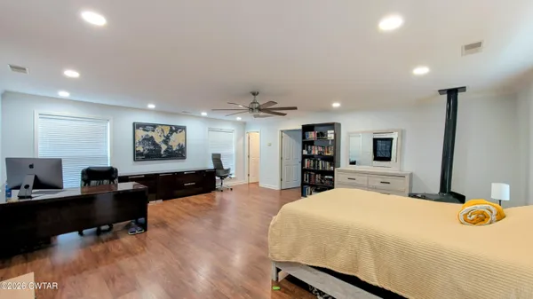 a room with lots of furniture and clutter