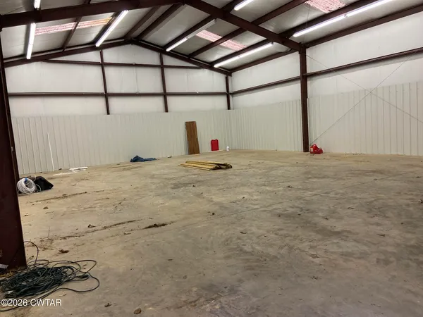 a view of a house with a small yard