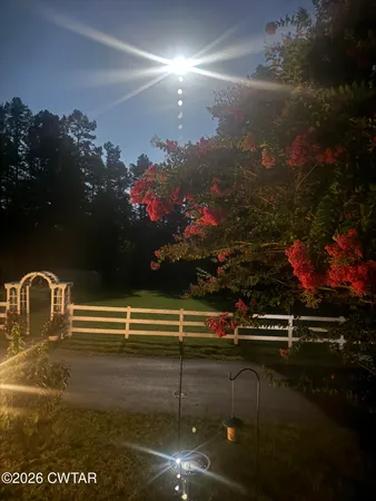 a view of a house with a big yard