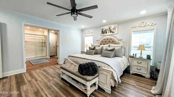 a bathroom with a glass shower door