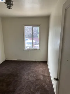 a view of hallway with walk in closet