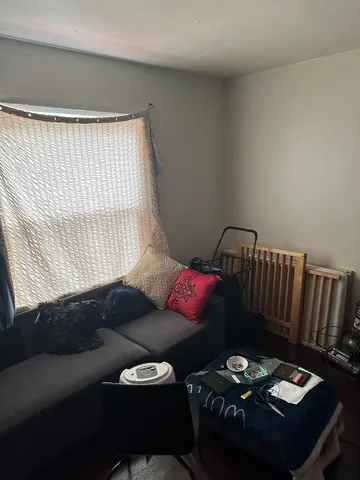 a room with furniture and a flat screen tv