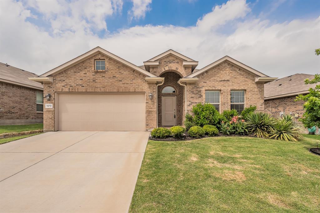 1212 Bosque Lane Weatherford, TX 76087 - Photo 1 of 38 a front view of a house with a yard