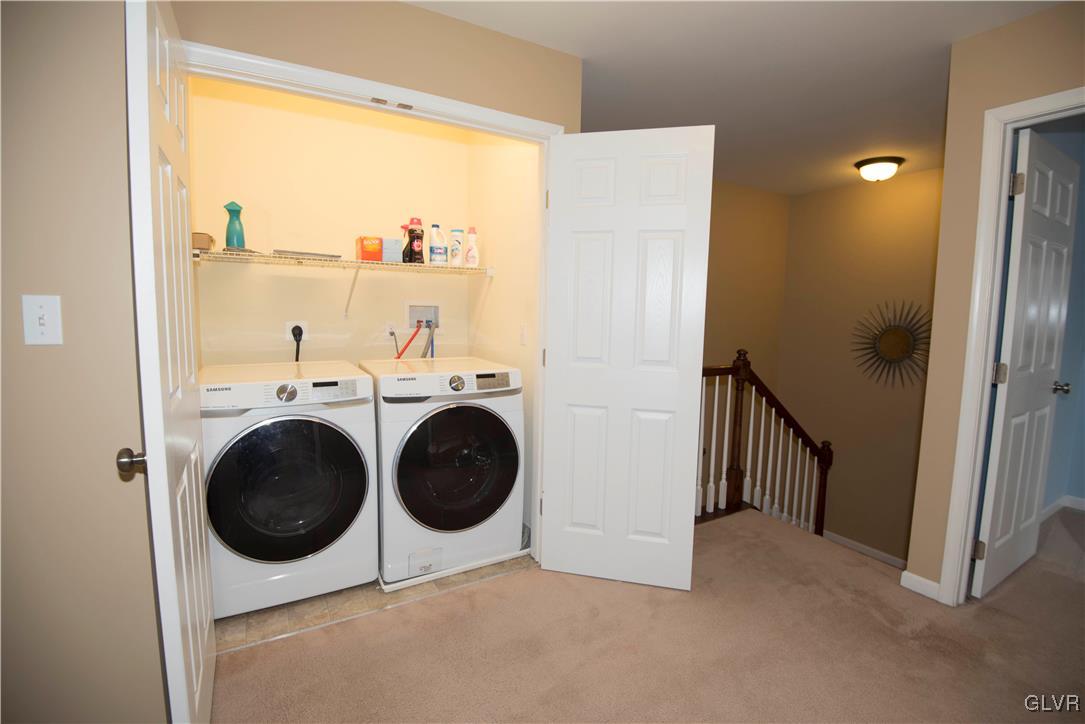2406 Gentle Hollow Road Whitehall, PA 18052 - Photo 21 of 37 a view of a hallway with washer and dryer