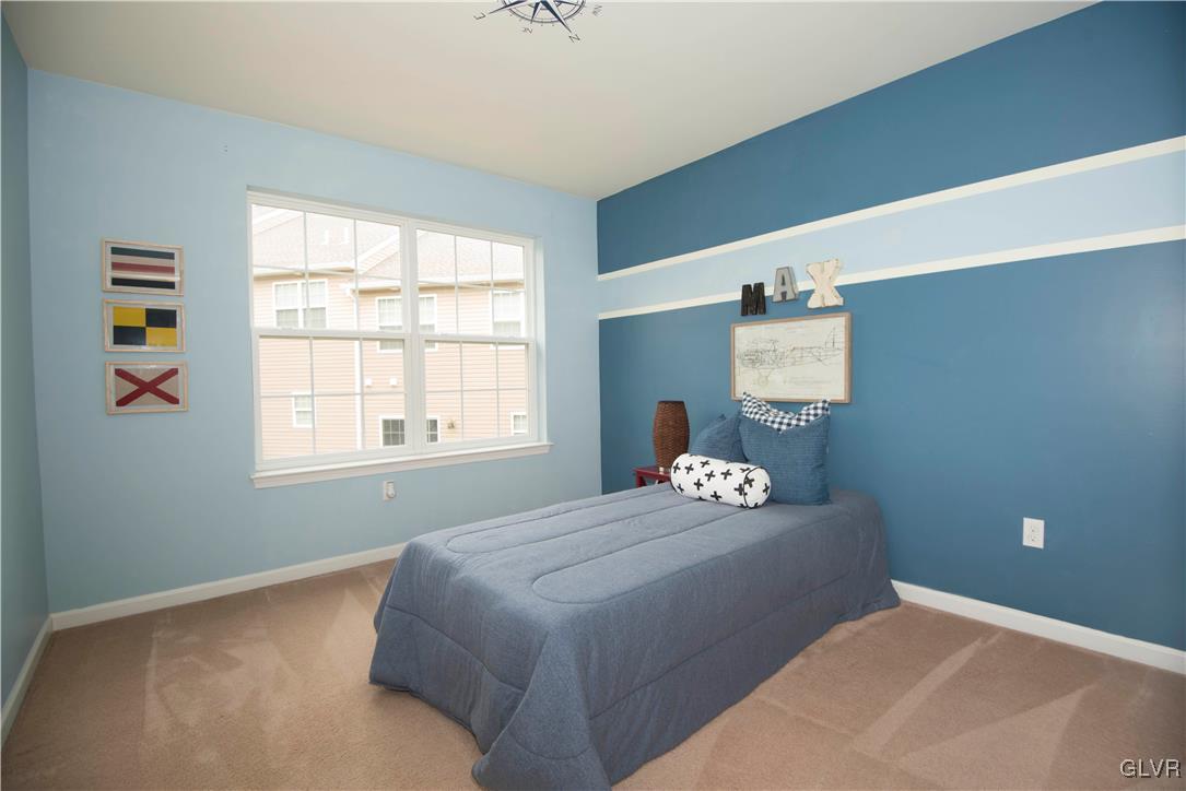 2406 Gentle Hollow Road Whitehall, PA 18052 - Photo 29 of 37 a bedroom with a bed and window