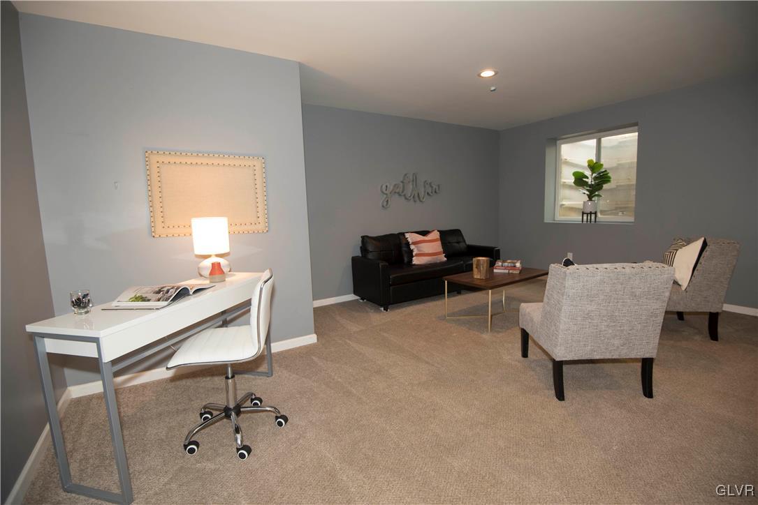 2406 Gentle Hollow Road Whitehall, PA 18052 - Photo 33 of 37 a living room with furniture and a window
