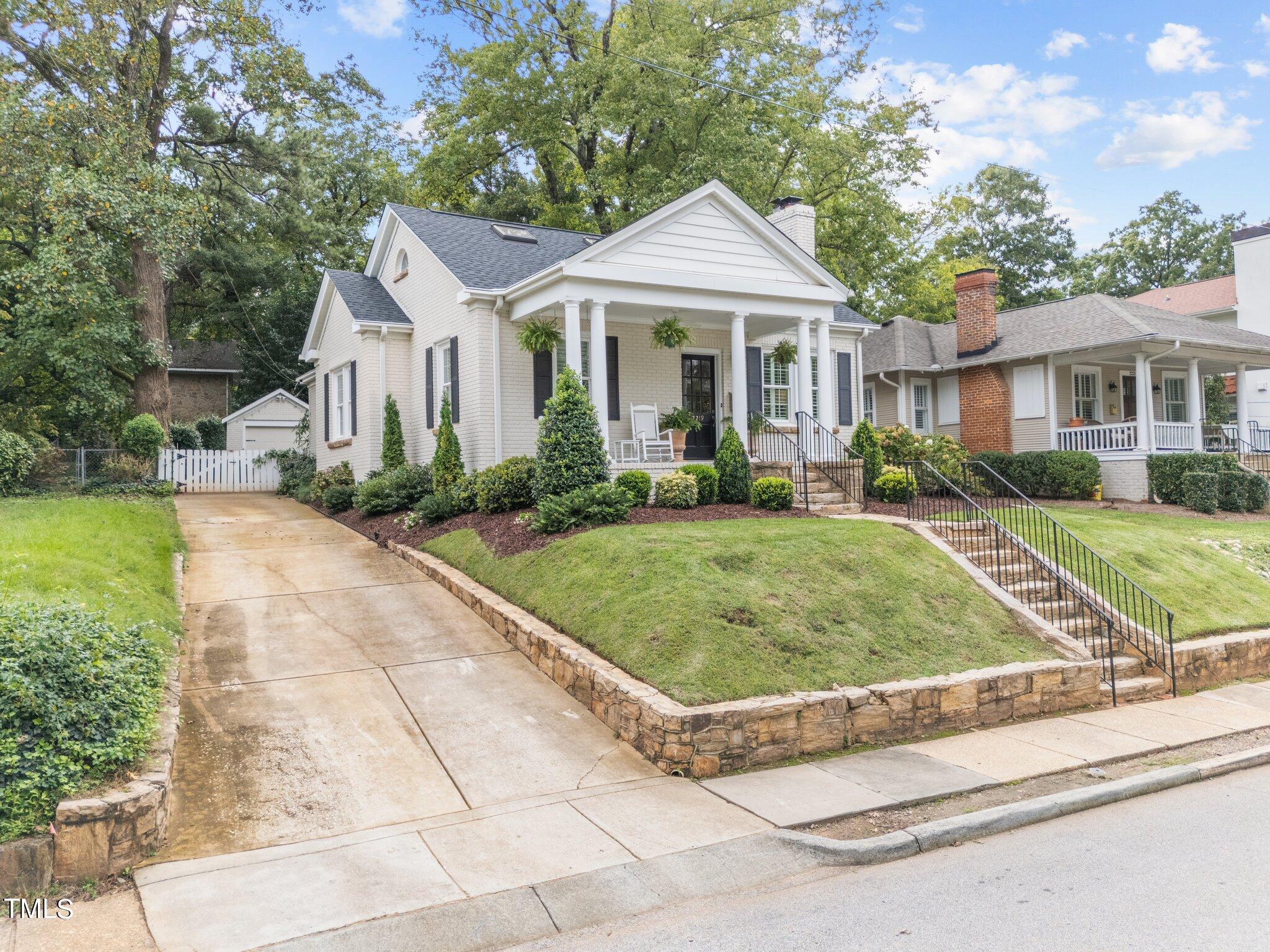 2219 Creston Road Raleigh, NC 27608 - Photo 1 of 45 52-web-or-mls-DJI_20241002154002_0901_D