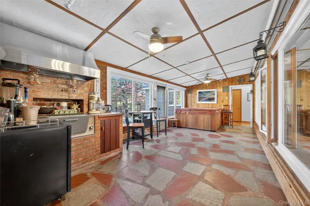 a view of a kitchen with furniture and a kitchen