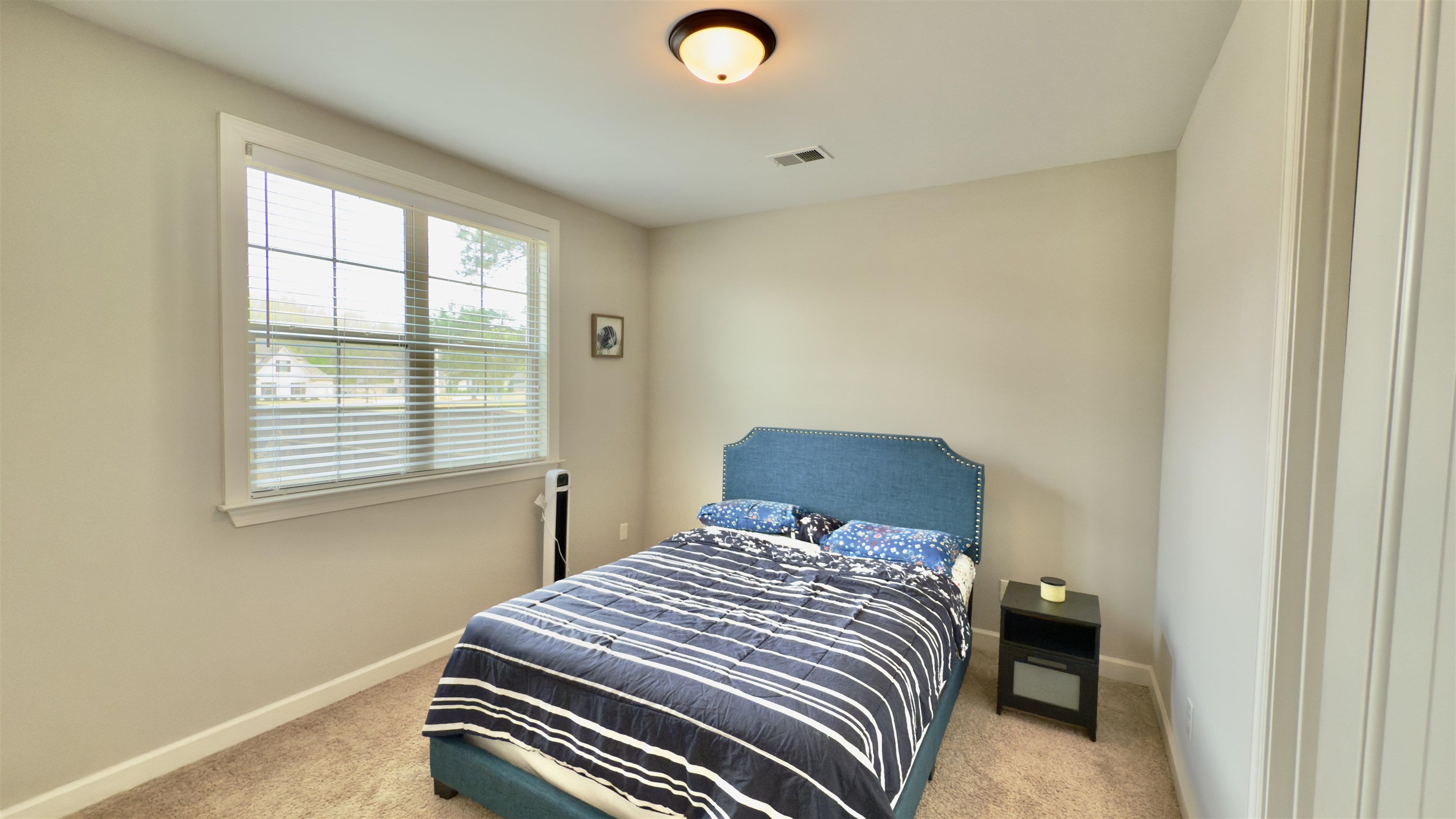 1280 Mountain Side Drive Collierville, TN 38017 - Photo 14 of 29 Carpeted bedroom featuring baseboards and visible vents