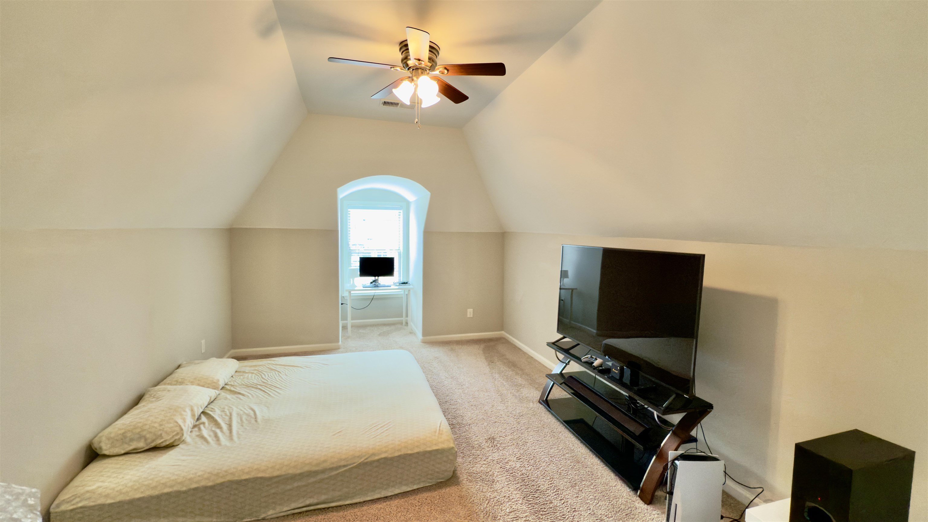 1280 Mountain Side Drive Collierville, TN 38017 - Photo 20 of 29 Bedroom featuring light carpet, baseboards, vaulted ceiling, and a ceiling fan