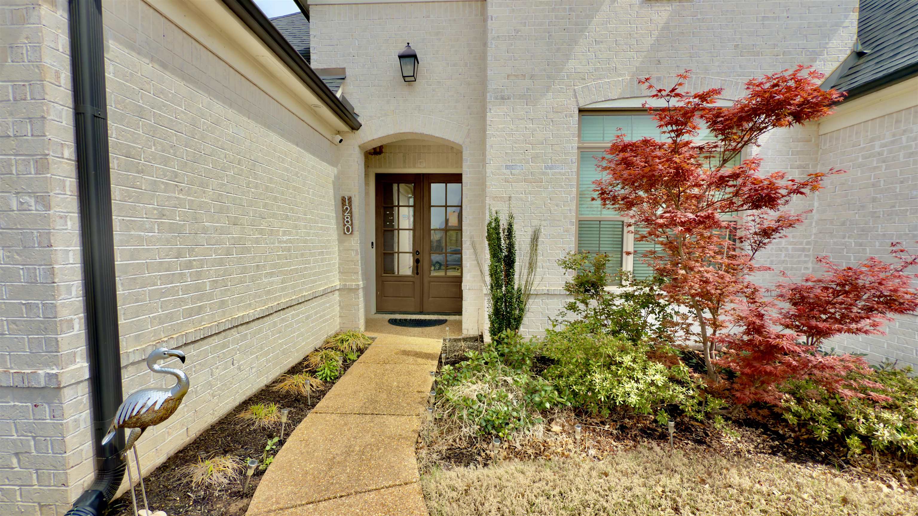 1280 Mountain Side Drive Collierville, TN 38017 - Photo 3 of 29 Entrance to property featuring brick siding and french doors