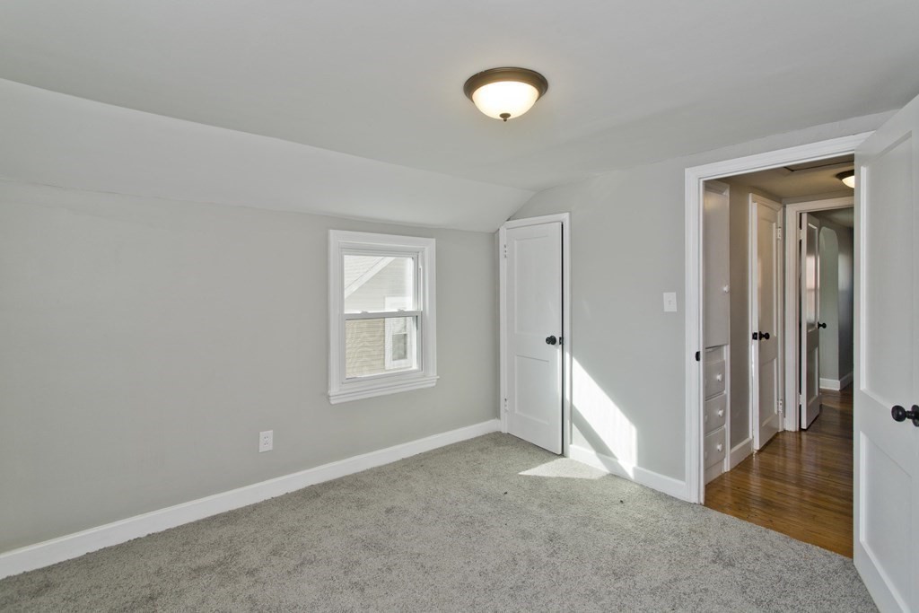 138 Appleton Street Springfield, MA 01108 - Photo 21 of 42 an empty room with windows