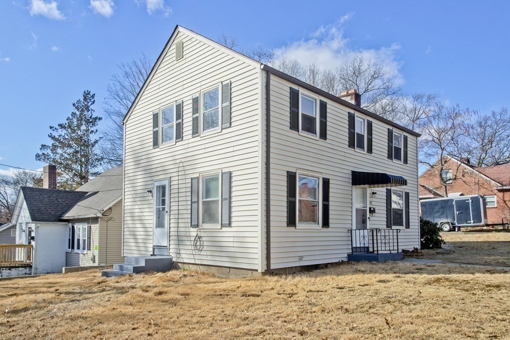138 Appleton Street Springfield, MA 01108 - Photo 4 of 42 a view of a house with a yard