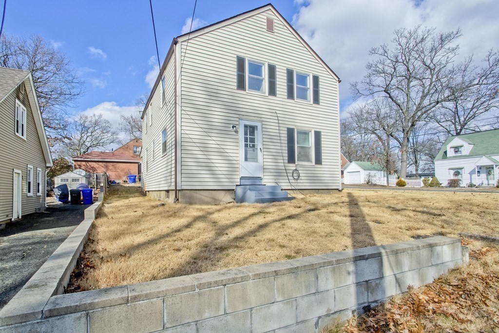 138 Appleton Street Springfield, MA 01108 - Photo 42 of 42 a front view of a house with a yard