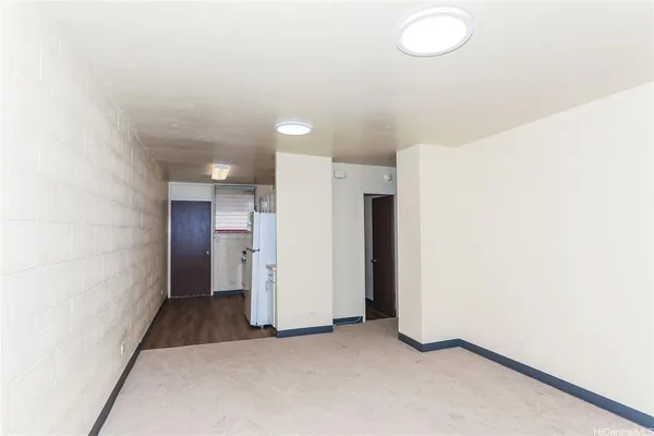 an empty room with a bathroom
