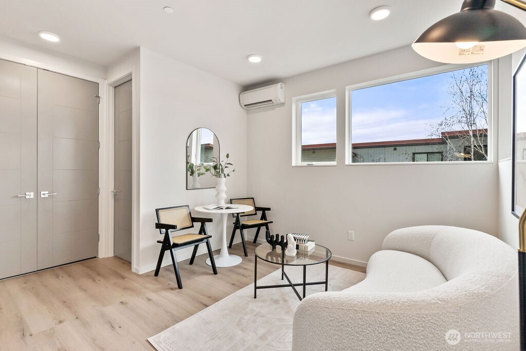 2925 Franklin Avenue East, Unit A Seattle, WA 98102 - Photo 26 of 32 a workspace with furniture and window