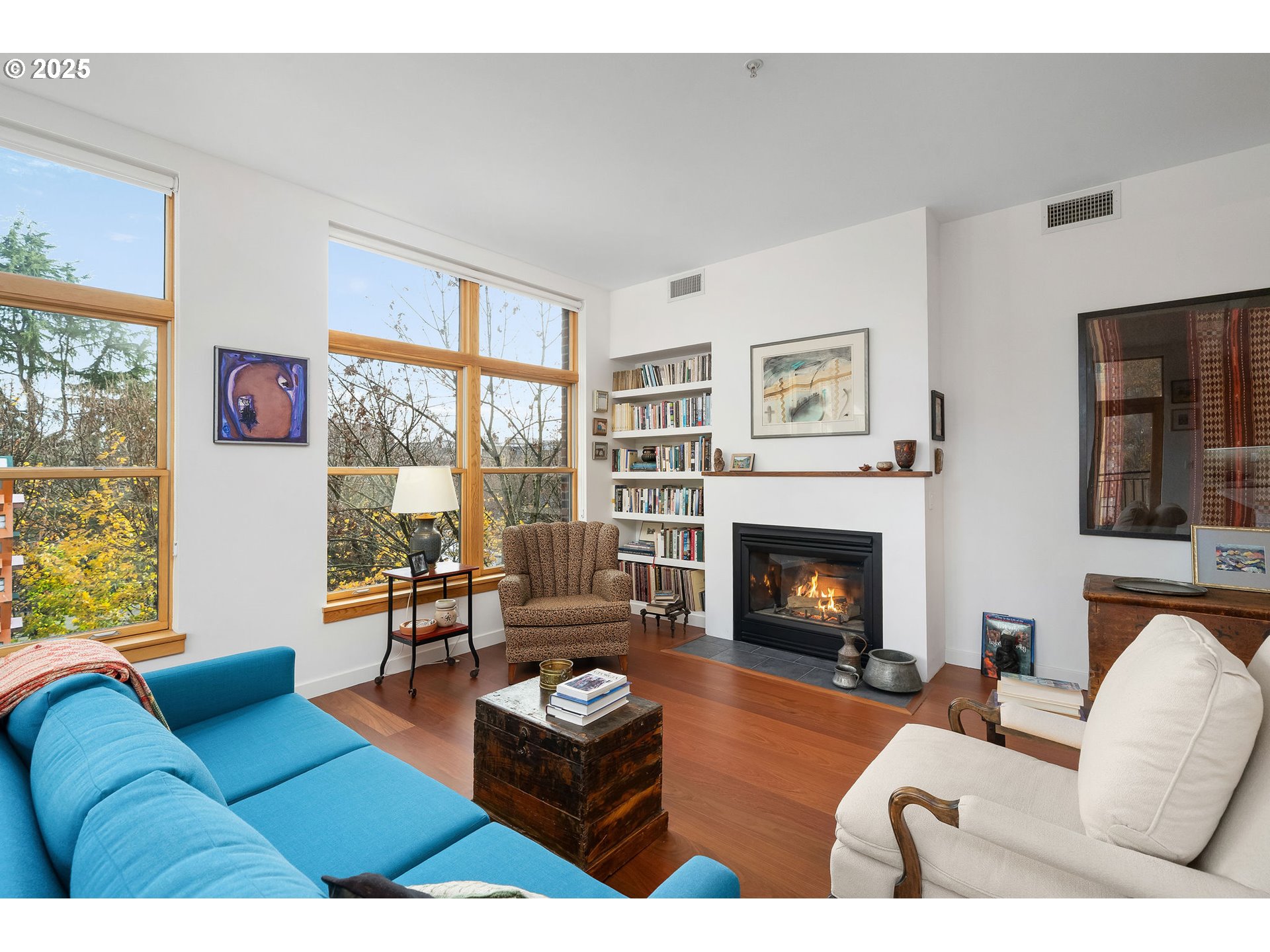 821 Northwest 11th Avenue, Unit 321 Portland, OR 97209 - Photo 12 of 48 a living room with furniture fireplace and window