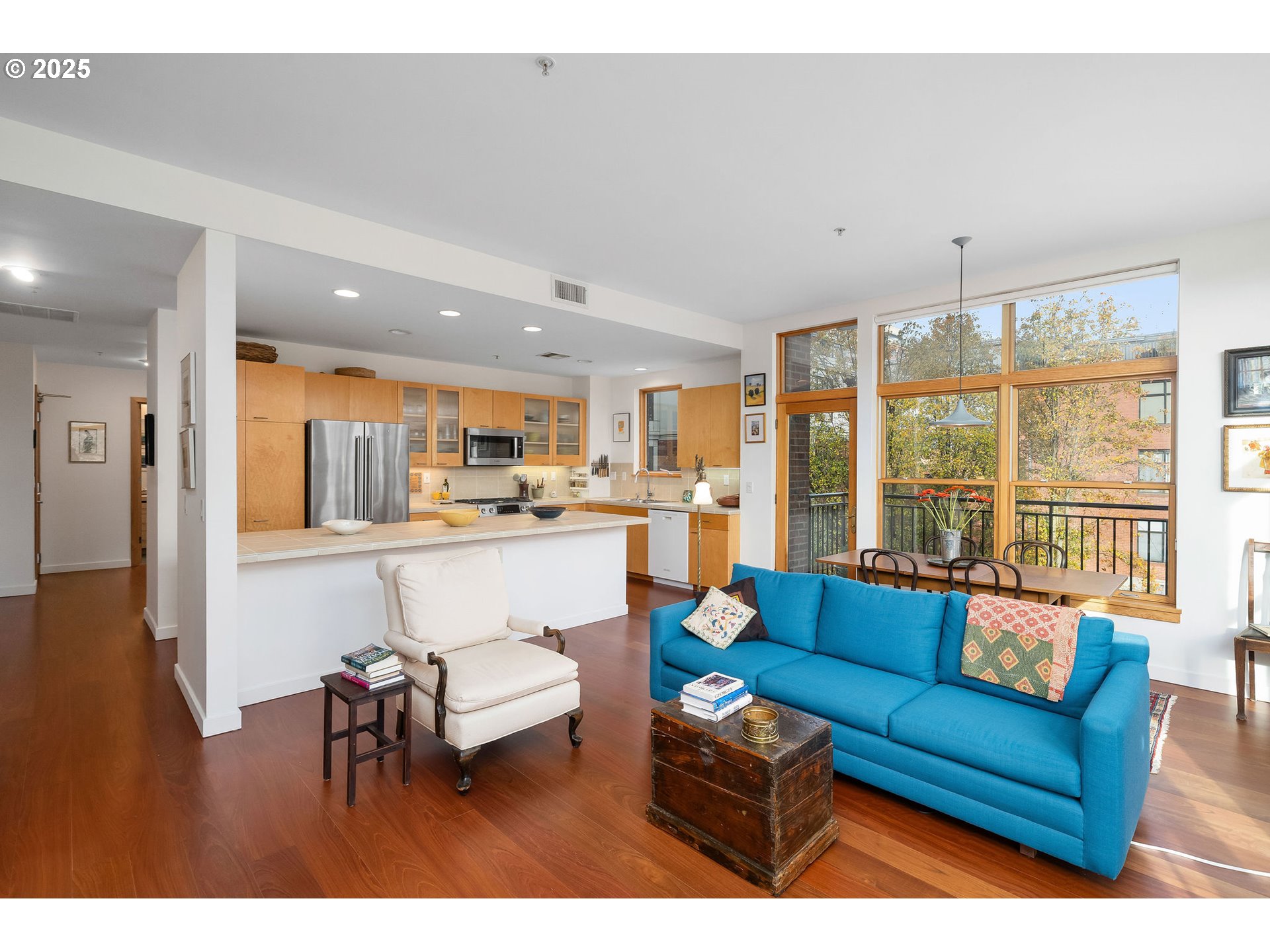 821 Northwest 11th Avenue, Unit 321 Portland, OR 97209 - Photo 9 of 48 a living room with furniture and a large window