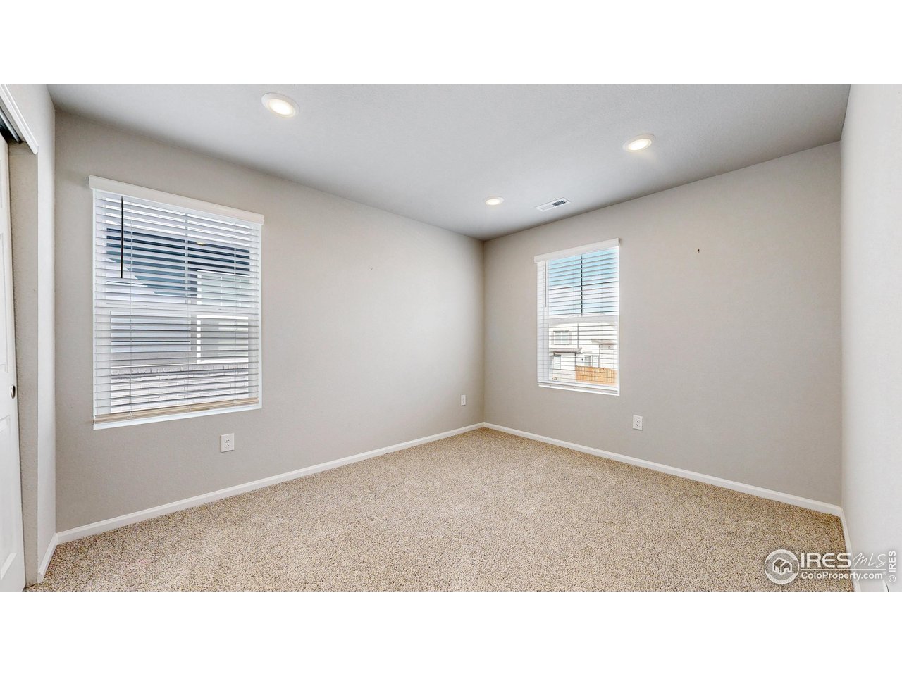 229 East 4th Street Berthoud, CO 80513 - Photo 20 of 49 a open hall with a window