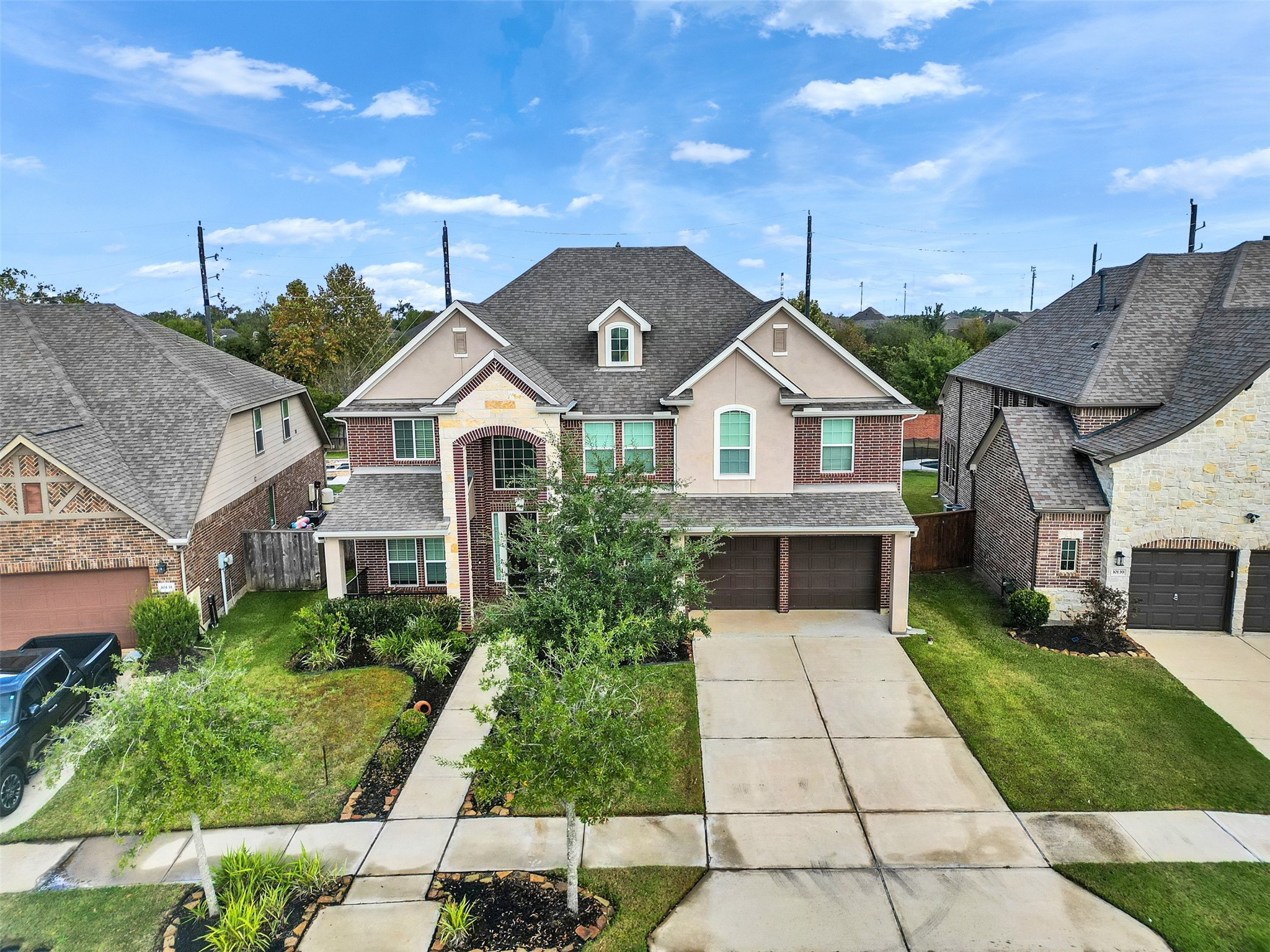10135 Cypress Path Missouri City, TX 77459 - Photo 1 of 40 a front view of a house with a garden