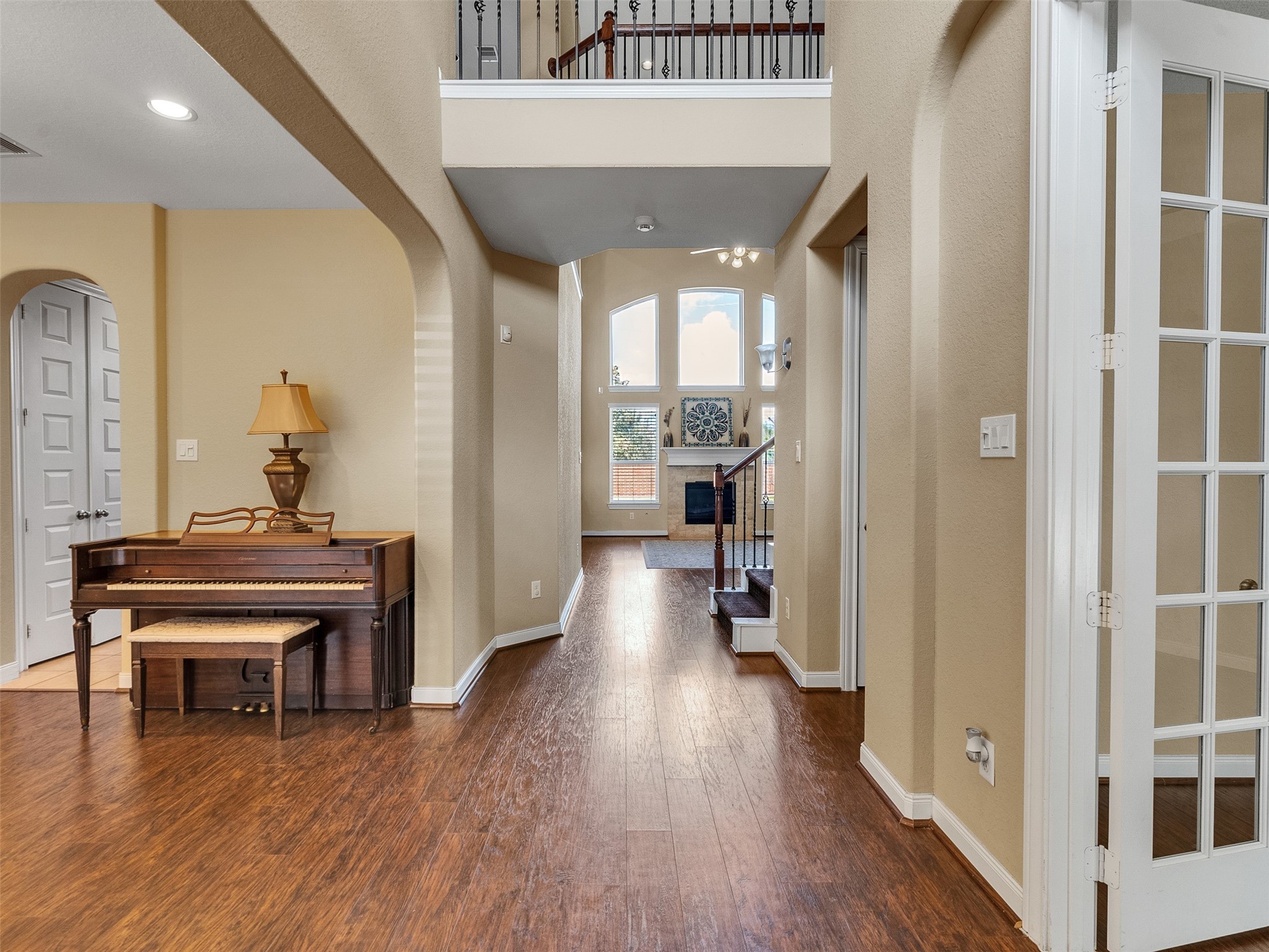 10135 Cypress Path Missouri City, TX 77459 - Photo 6 of 40 a view of a livingroom with wooden floor and furniture