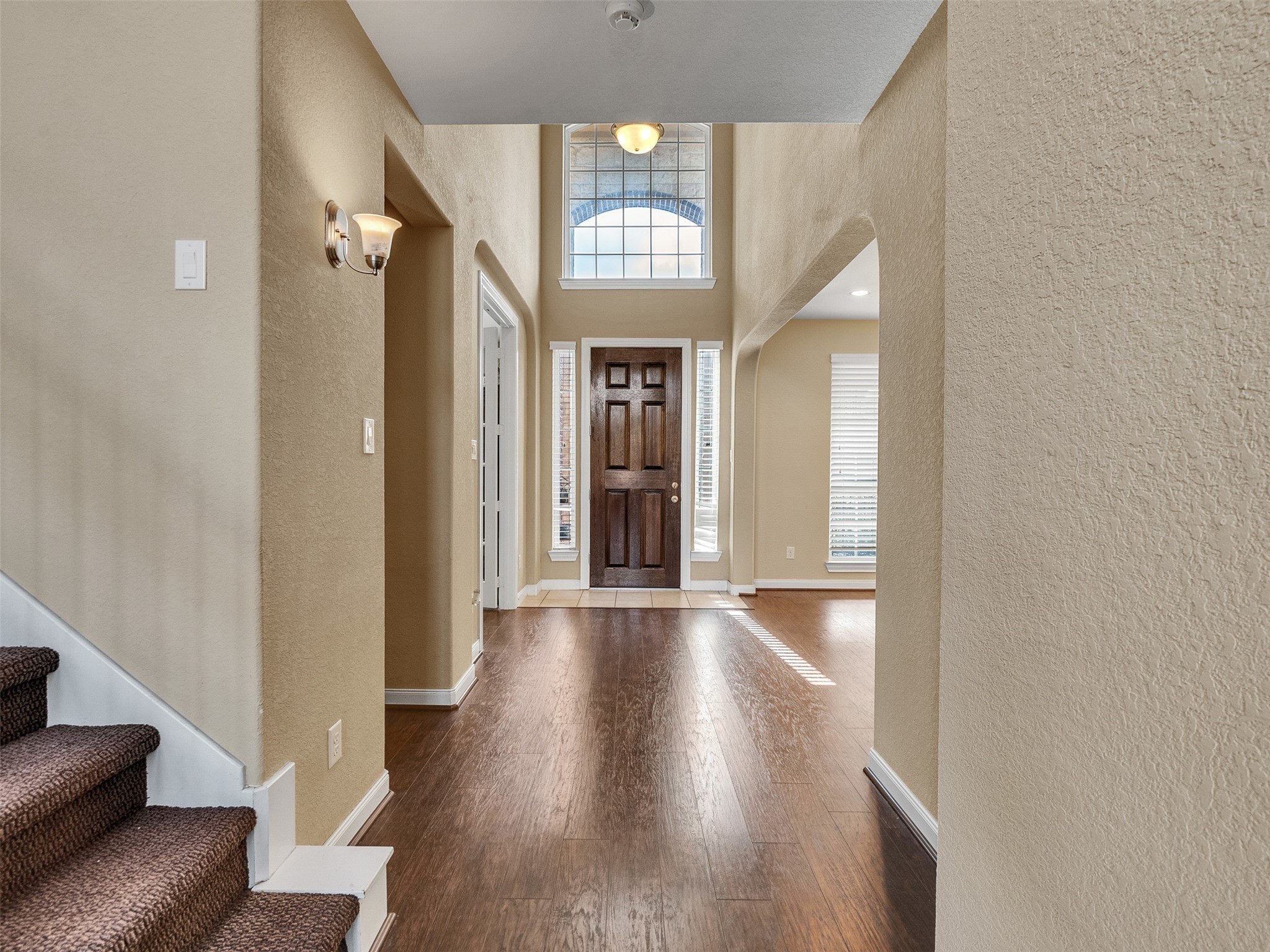10135 Cypress Path Missouri City, TX 77459 - Photo 9 of 40 wooden floor in a hall with a window
