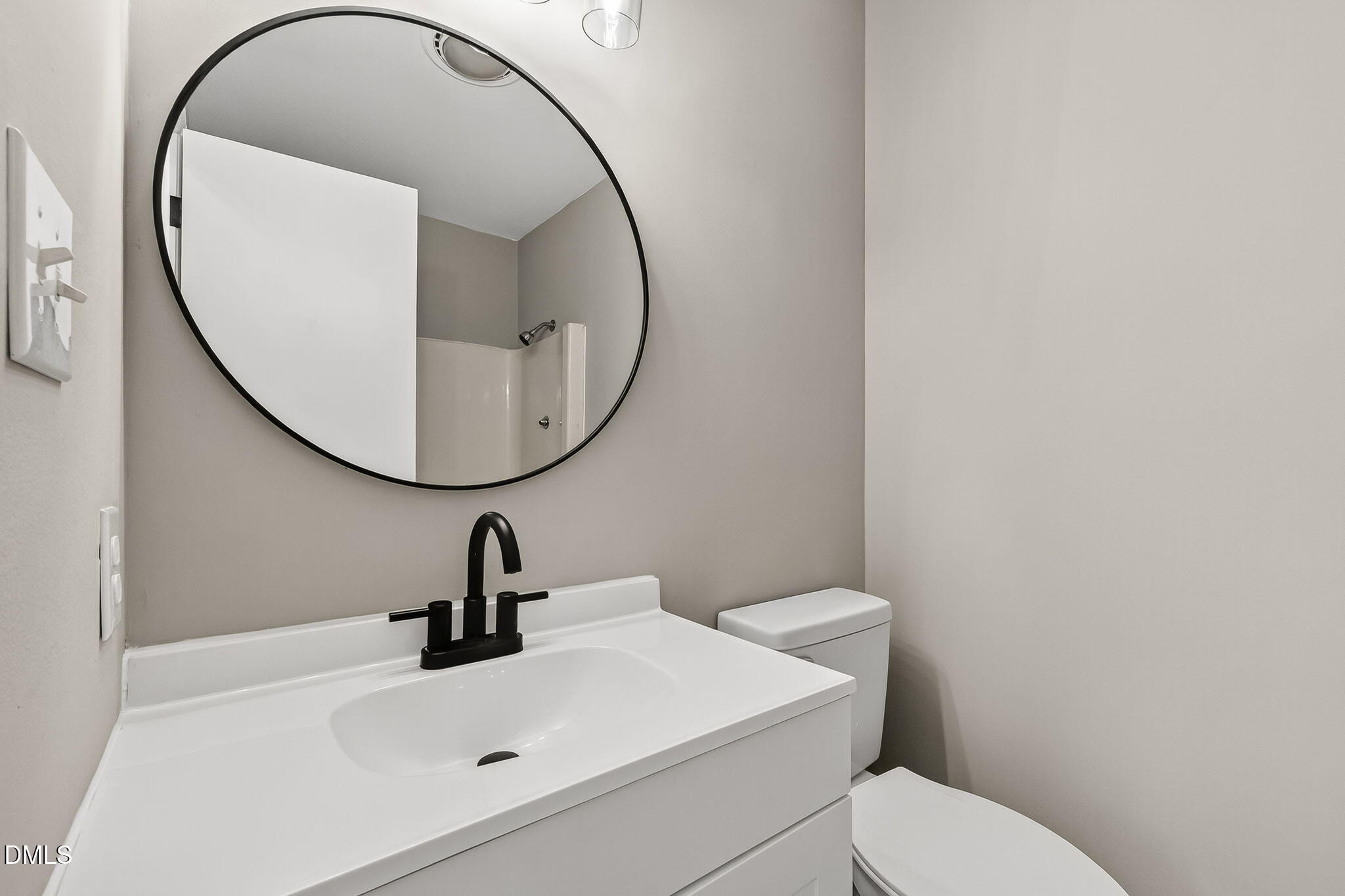505 Pineview Road Kenly, NC 27542 - Photo 16 of 35 a bathroom with a sink and mirror