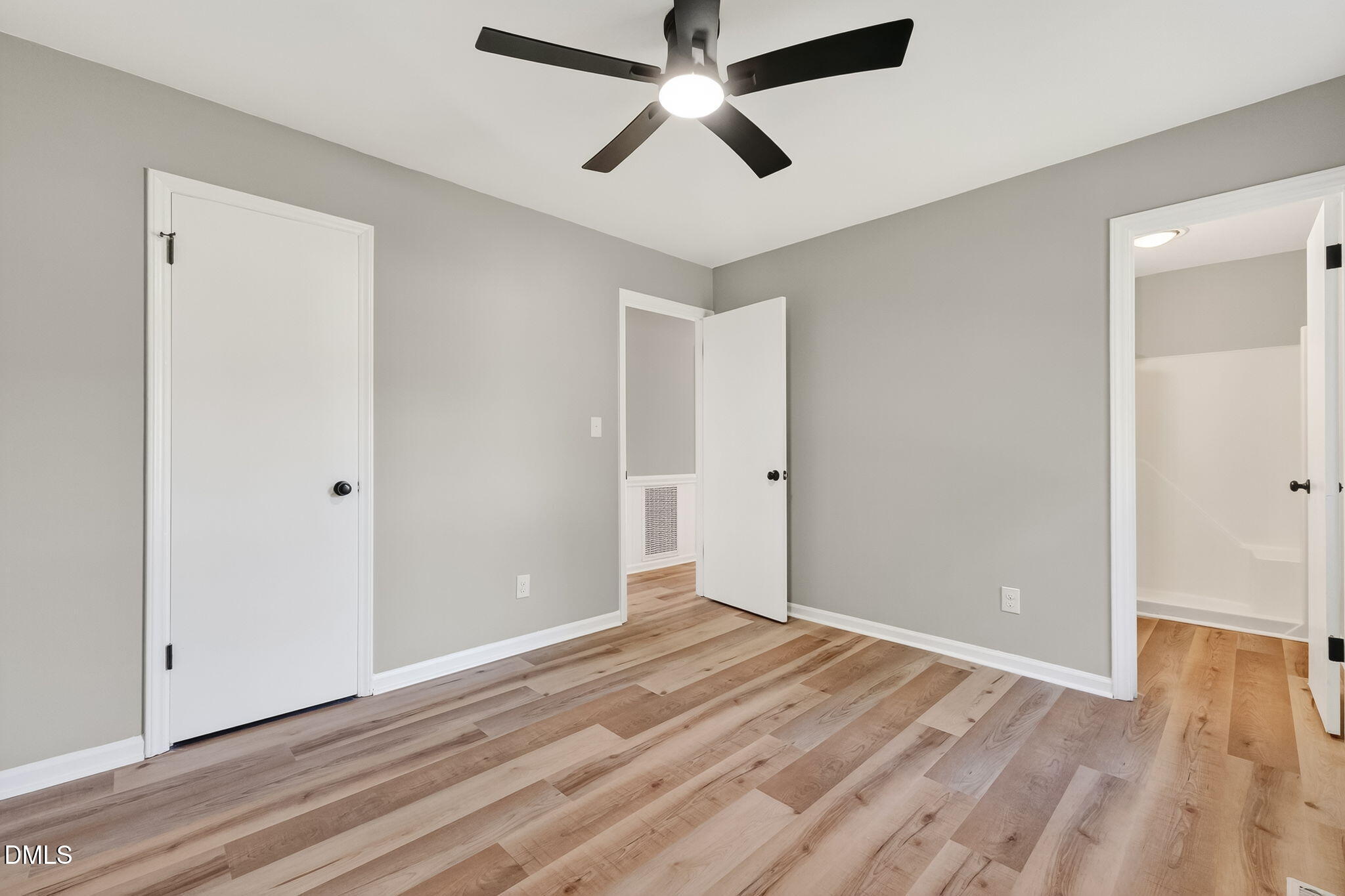 505 Pineview Road Kenly, NC 27542 - Photo 22 of 35 a view of empty room with wooden floor