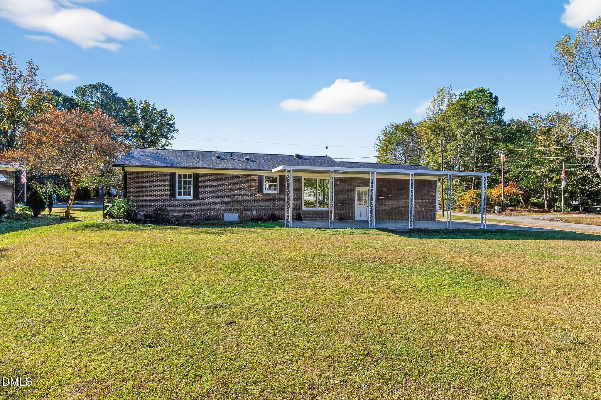 505 Pineview Road Kenly, NC 27542 - Photo 28 of 35 a view of a house with a swimming pool