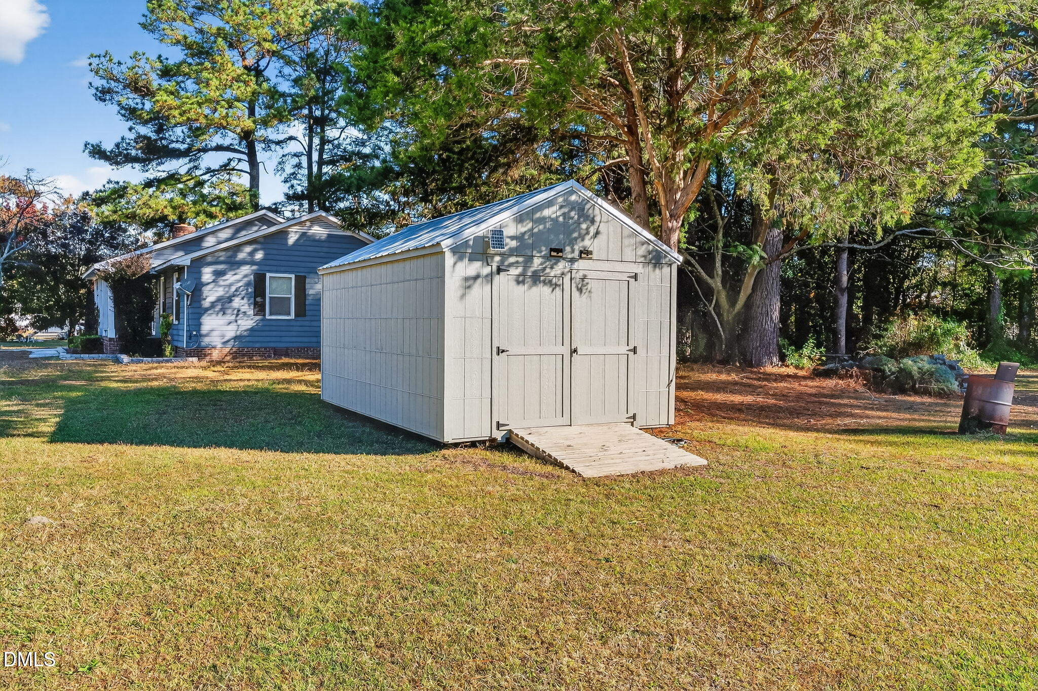505 Pineview Road Kenly, NC 27542 - Photo 30 of 35 a view of a house with yard and garage