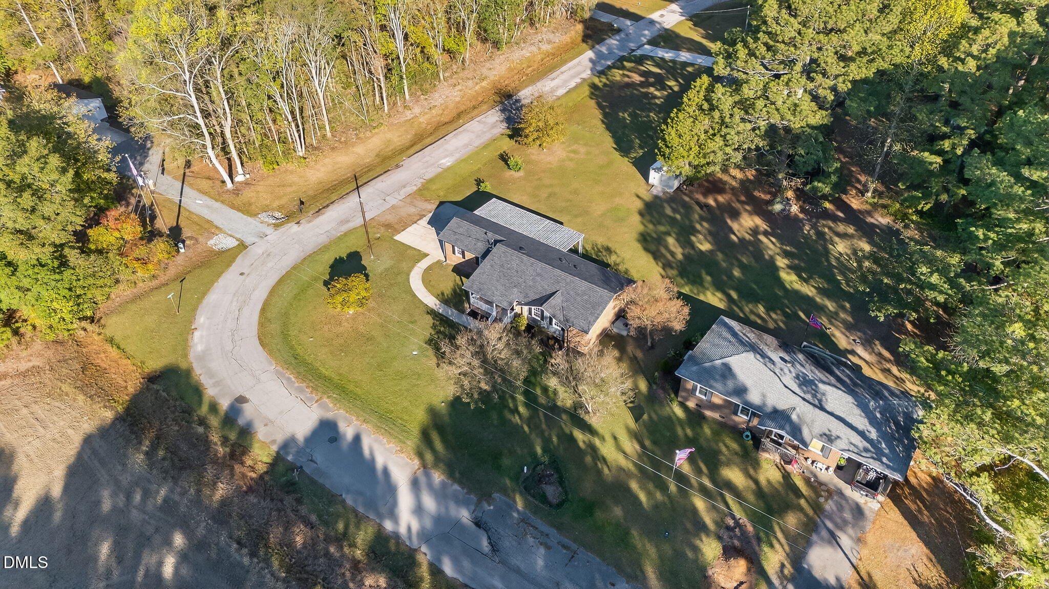 505 Pineview Road Kenly, NC 27542 - Photo 33 of 35 an aerial view of a house with a trees all around