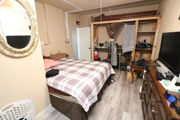 a kitchen with a sink a refrigerator and a stove