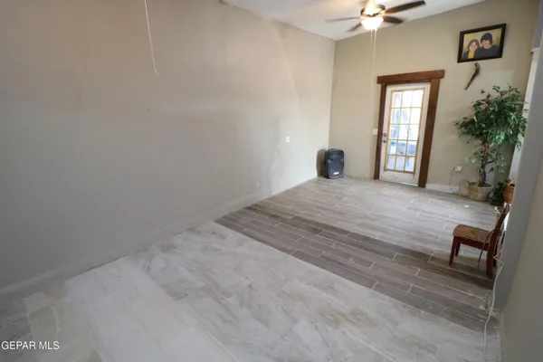 a kitchen with a sink a stove and cabinets