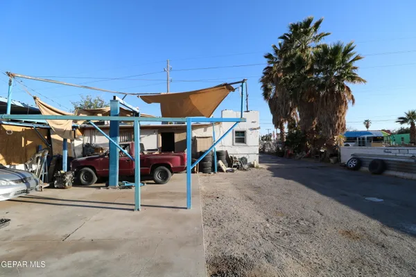 a bathroom with a sink a mirror and a shower