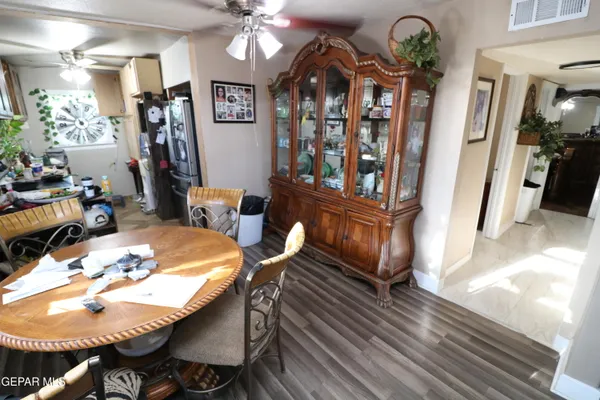 a workspace with lots of potted plants