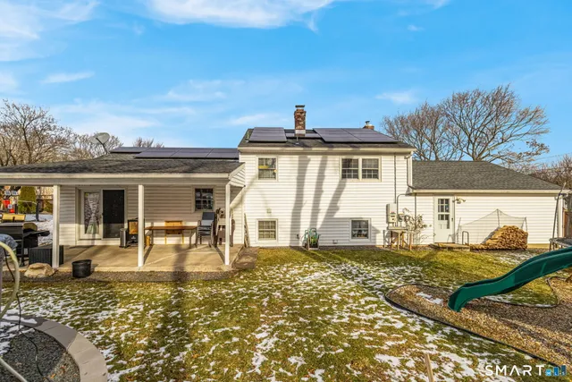 a house view with a garden space