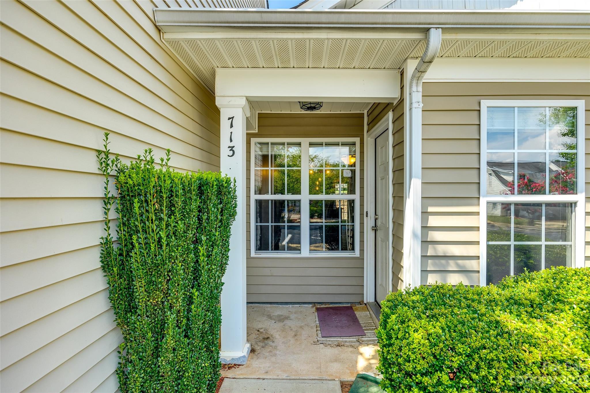 713 Waterfall Way Clover, SC 29710 - Photo 3 of 27 a front view of a house with a yard