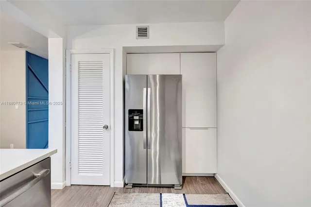 a view of front door with hallway