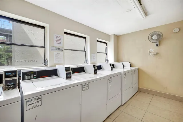 a kitchen that has a sink and a stove