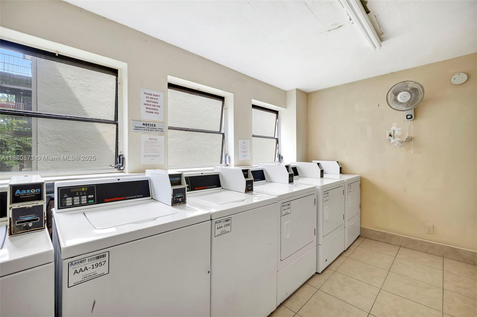 6010 South Falls Cir Drive, Unit 419 Lauderhill, FL 33319 - Photo 26 of 45 a kitchen that has a sink and a stove