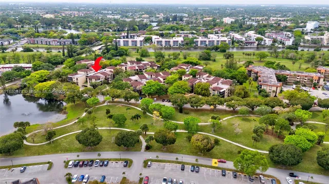 an aerial view of house with yard